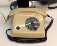 The vintage rotary phone (built around 1980).