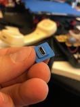 3d printed adapter holding the Micro-USB socket.