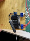 Microcontroller and additional components wired up on a perfboard. Microcontroller and additional components wired up on a perfboard.